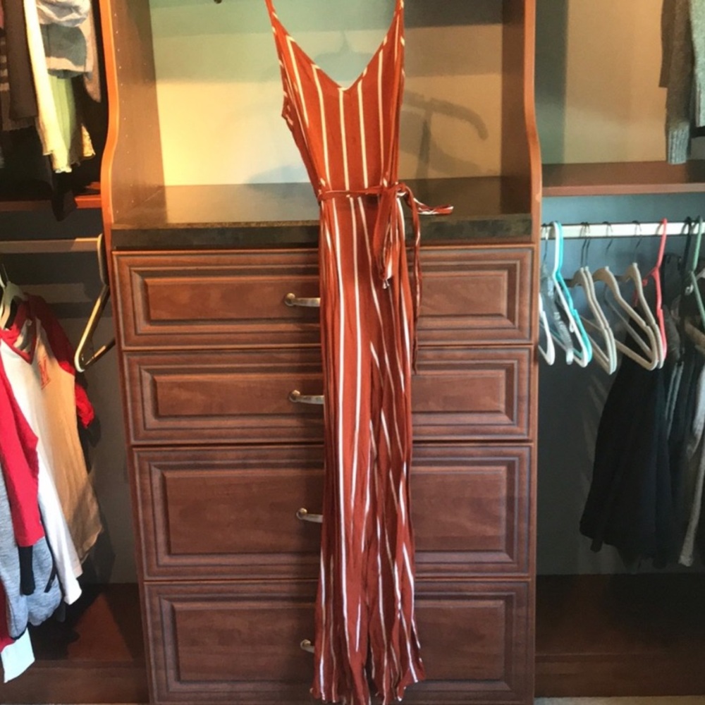 Orange and white striped jumpsuit with tie